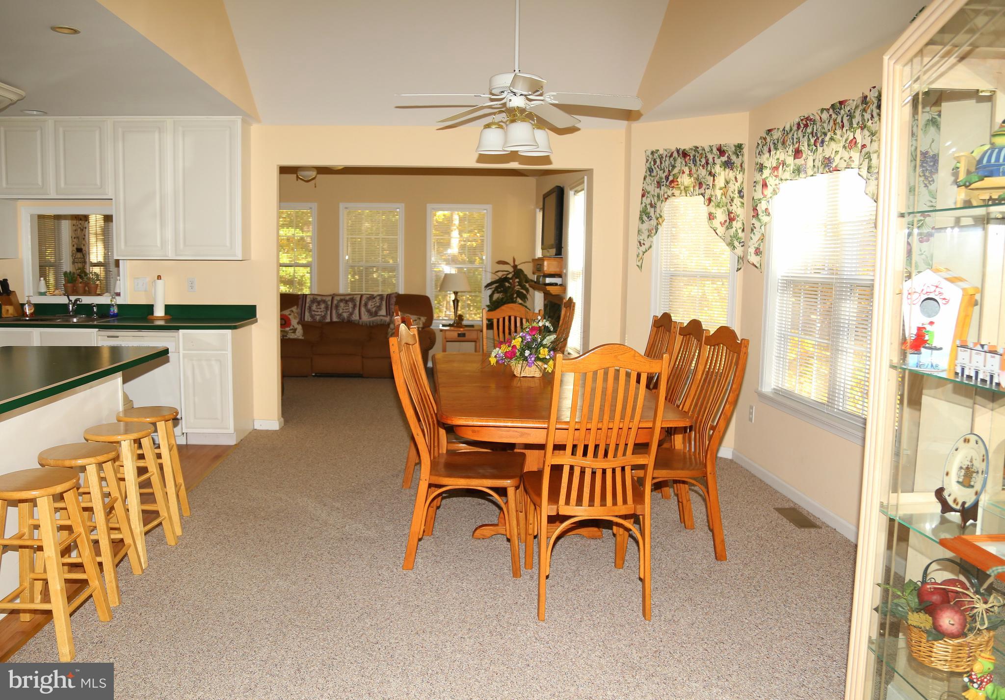 43 Falcon Bridge Road Ocean Pines, MD 21811 - Photo 4 of 30 a dining room with furniture and window