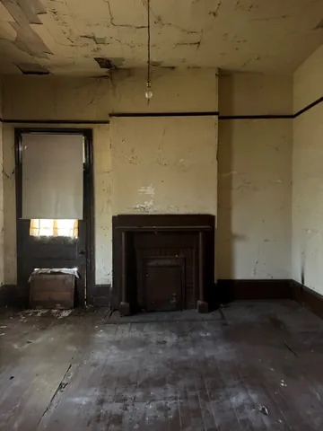 a bathroom with a sink toilet and mirror