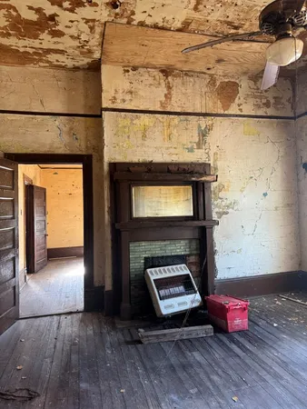 a living room with a fireplace