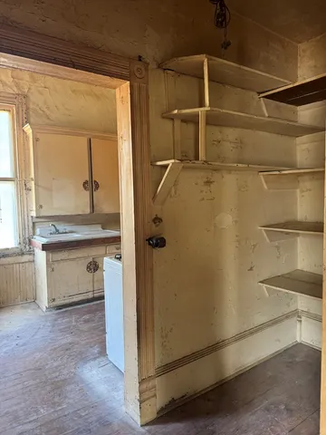 a bathroom with a shower and a sink