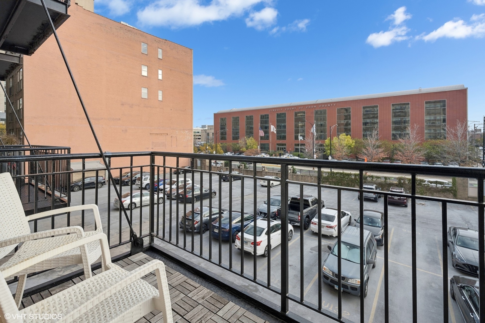 500 South Clinton Street, Unit 227 Chicago, IL 60607 - Photo 12 of 20 a view of a balcony with chairs