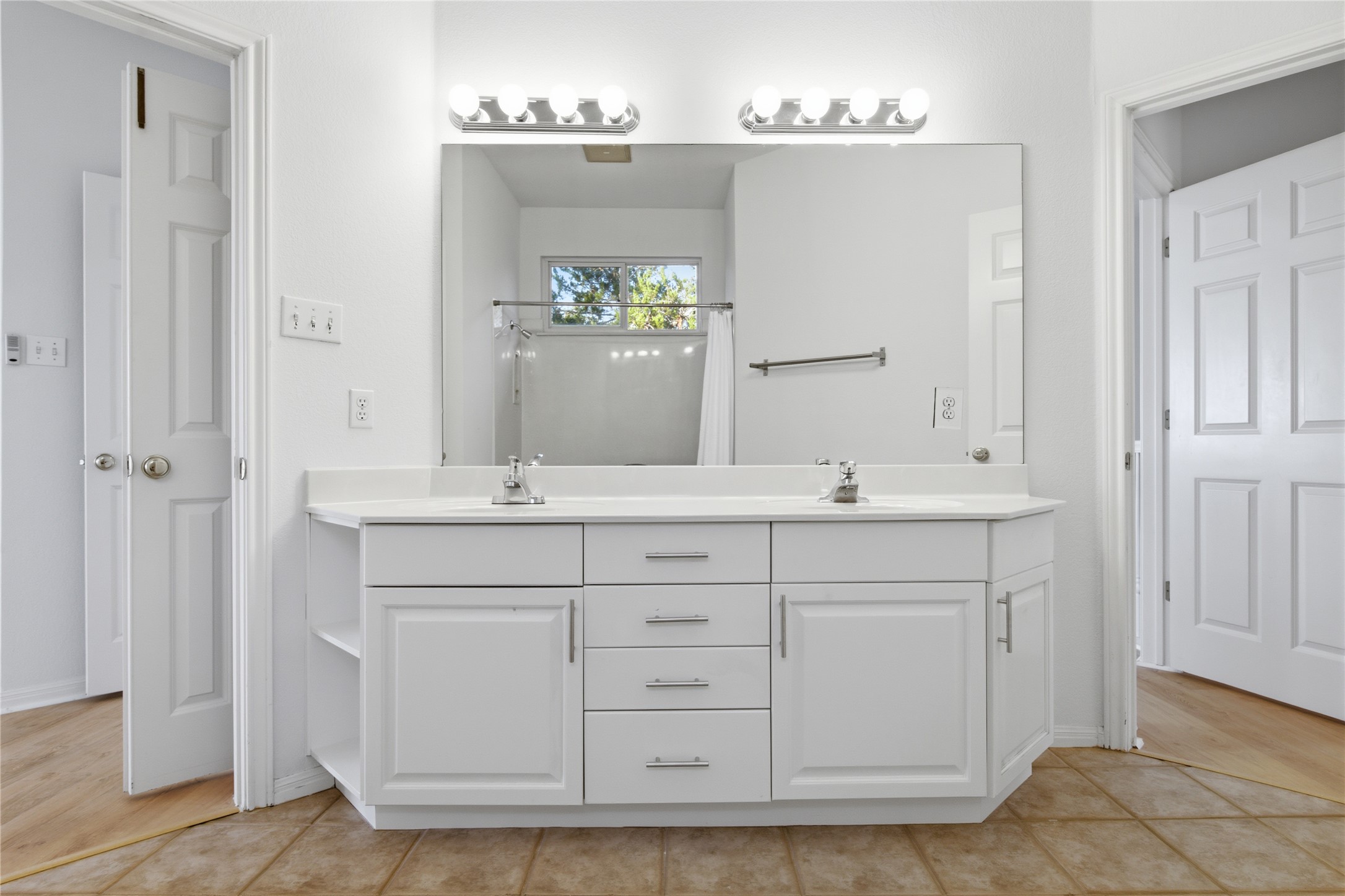 8204 Texas Plume Road Austin, TX 78759 - Photo 29 of 40 A pristine double vanity with ample storage defines this well-appointed bathroom.