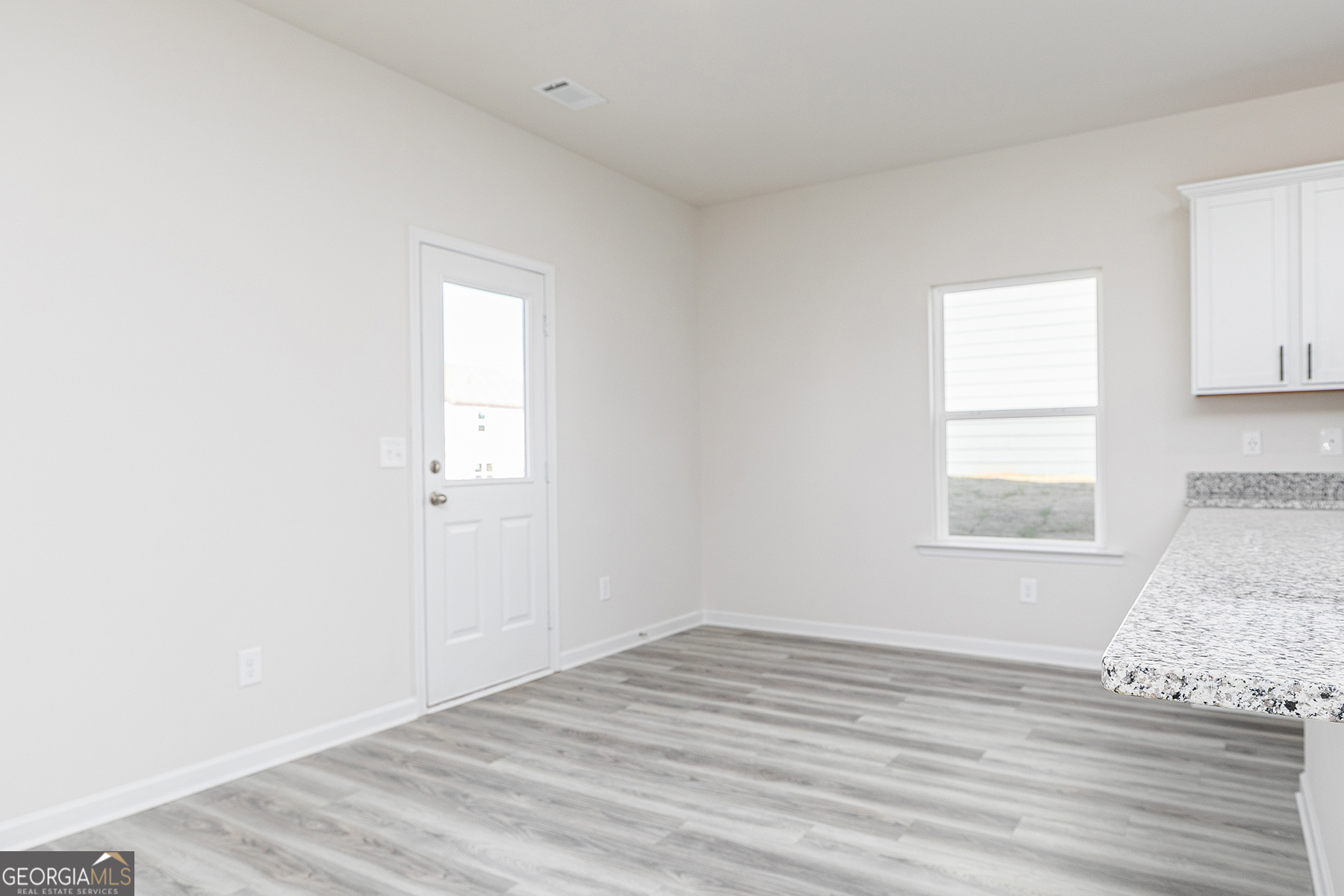 482 Prescott Way Villa Rica, GA 30180 - Photo 11 of 17 a view of empty room with wooden floor