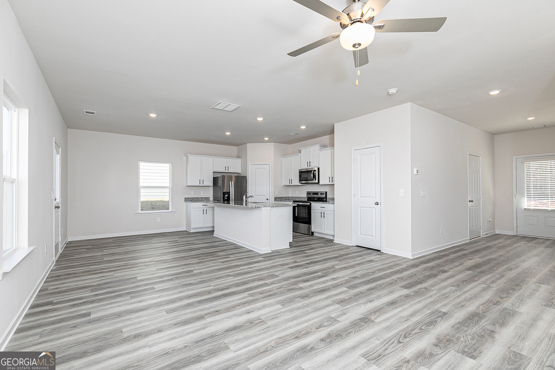 482 Prescott Way Villa Rica, GA 30180 - Photo 6 of 17 a view of kitchen view with wooden floor and window