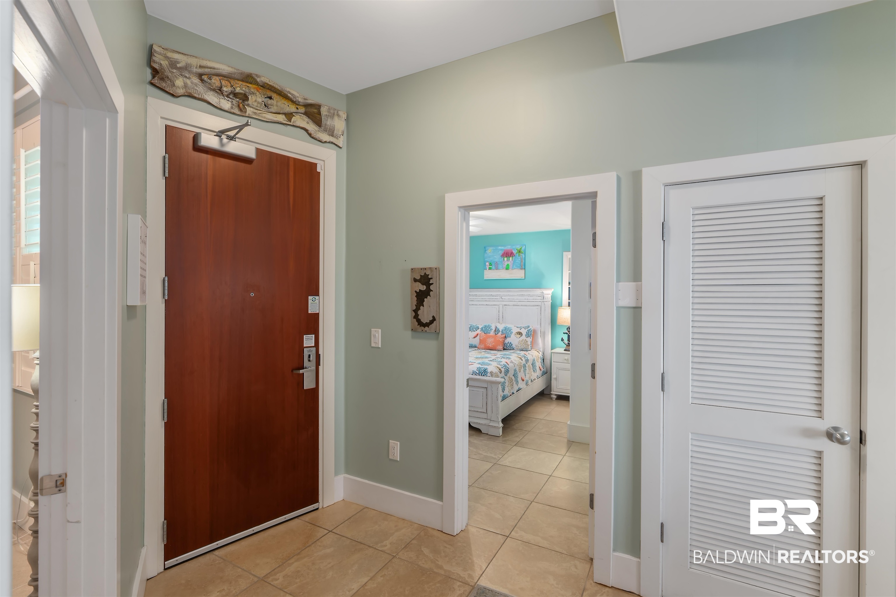 28107 Perdido Beach Boulevard, Unit DPH06 Orange Beach, AL 36561 - Photo 21 of 70 Foyer entrance featuring light tile patterned flooring