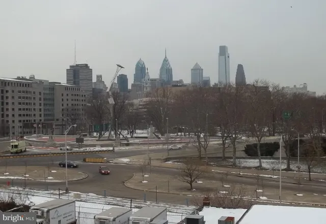 a kitchen with stainless steel appliances a stove a sink and a refrigerator