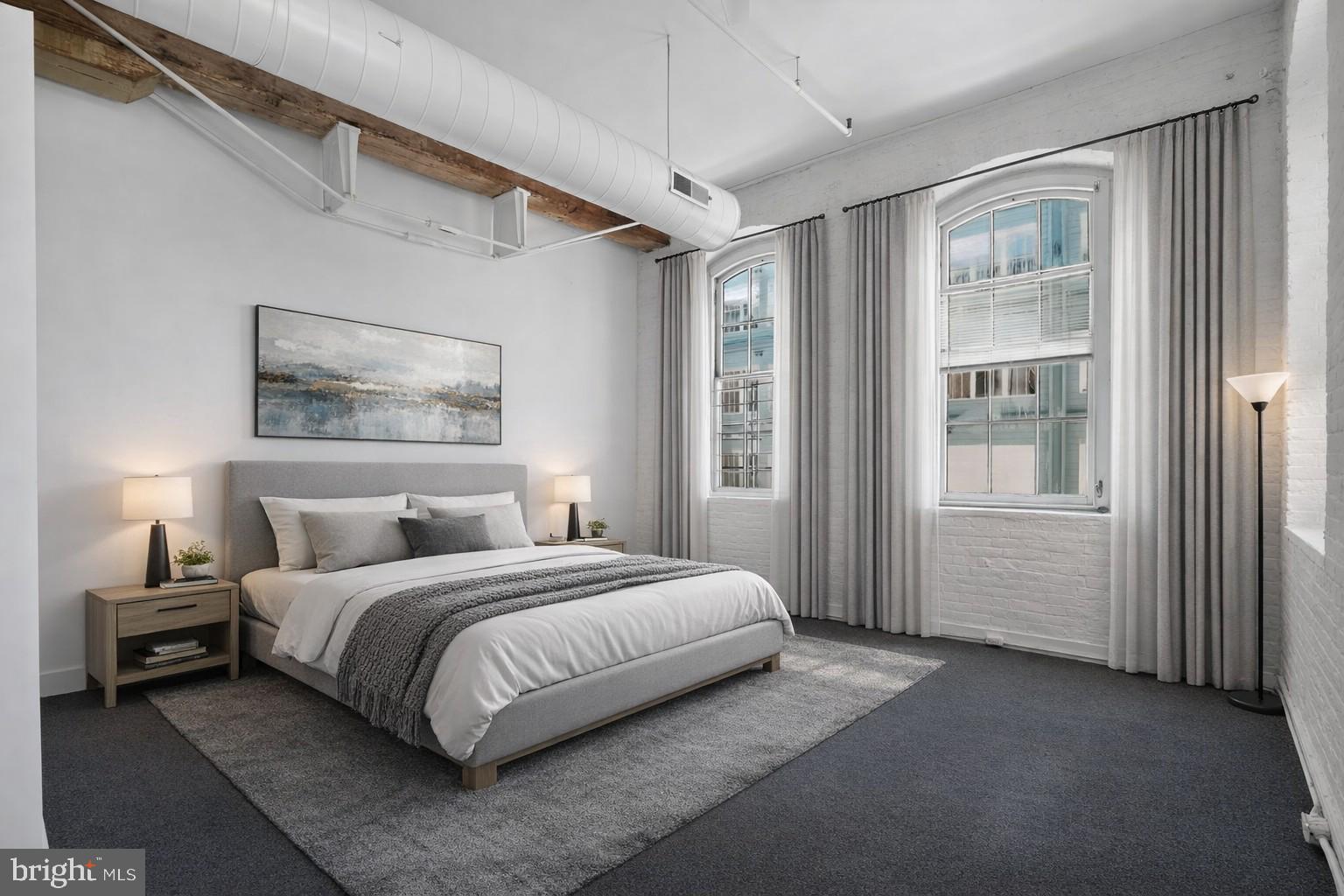 408 Vine Street, Unit 2A Philadelphia, PA 19106 - Photo 14 of 19 a bedroom with a large bed and a window