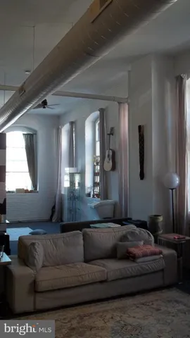 a kitchen with a stove and cabinets