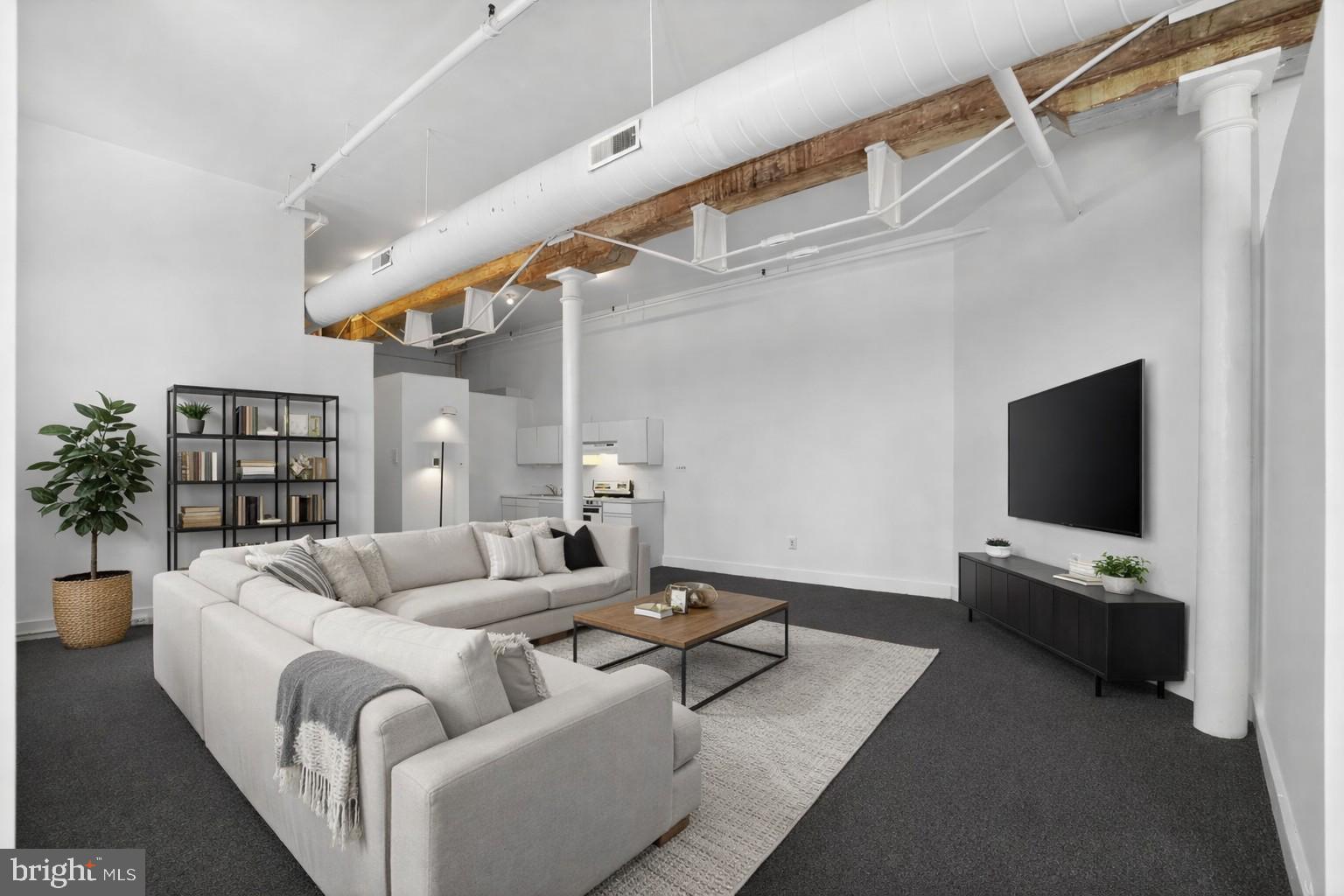 408 Vine Street, Unit 2A Philadelphia, PA 19106 - Photo 3 of 19 a living room with furniture and a flat screen tv