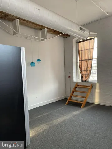 a view of room with air conditioner and window