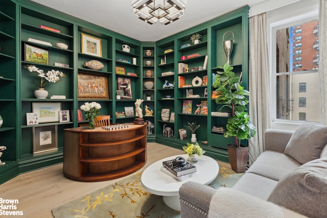 37 West 93rd Street, Unit 17/13 Manhattan, NY 10025 - Photo 5 of 11 a living room with furniture cabinets and potted plant