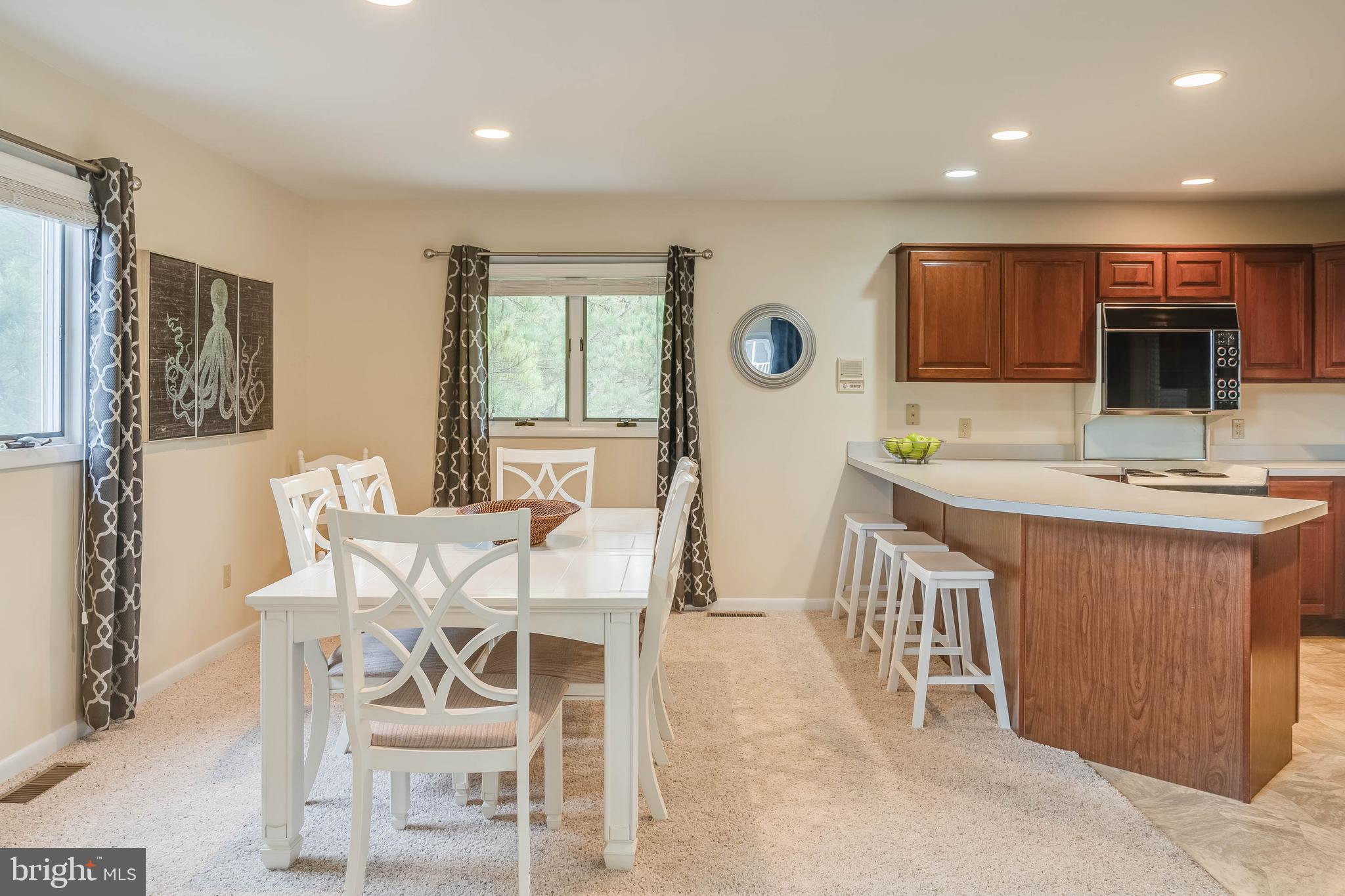 39687 Kittiwake Road Bethany Beach, DE 19930 - Photo 13 of 61 Kitchen and adjoining dining