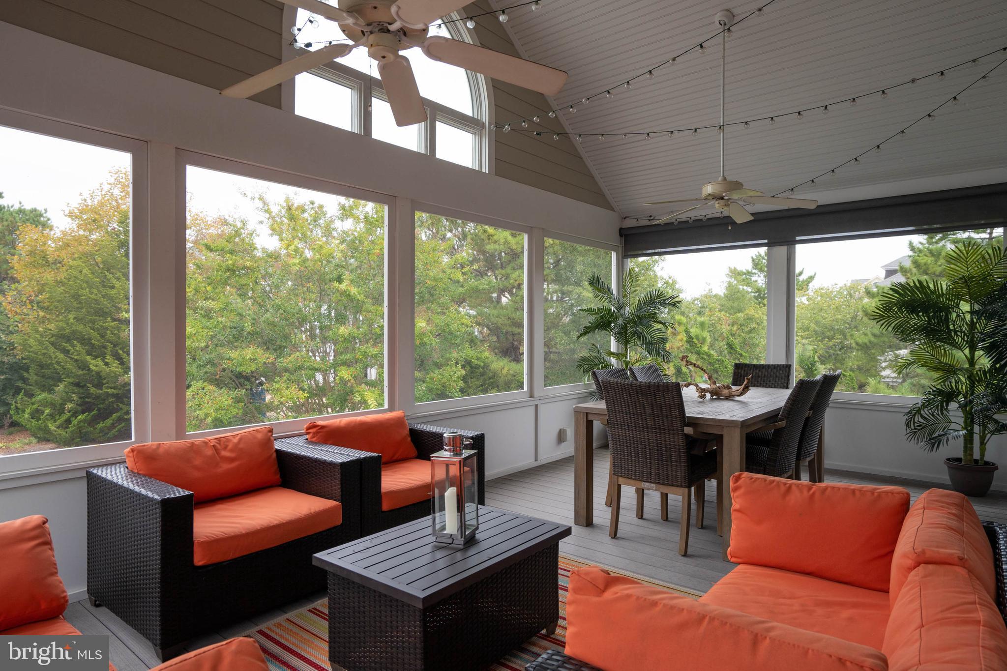 39687 Kittiwake Road Bethany Beach, DE 19930 - Photo 40 of 61 Large screened-in porch with ceiling fan