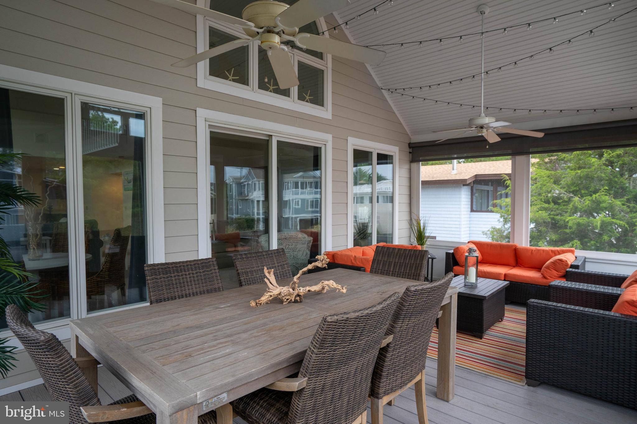 39687 Kittiwake Road Bethany Beach, DE 19930 - Photo 41 of 61 Outside dining and living area