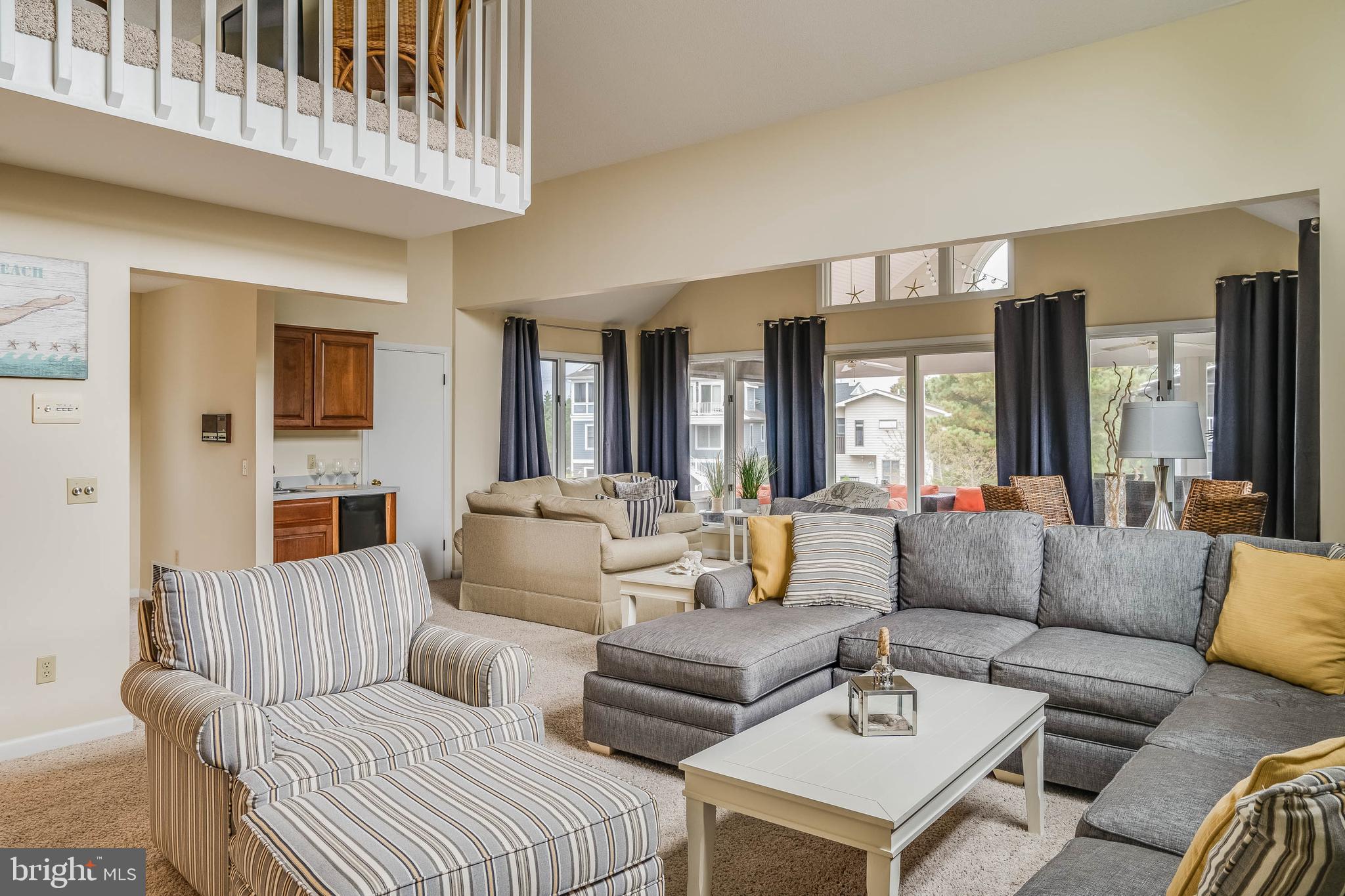 39687 Kittiwake Road Bethany Beach, DE 19930 - Photo 7 of 61 Two living spaces perfect for entertaining guests