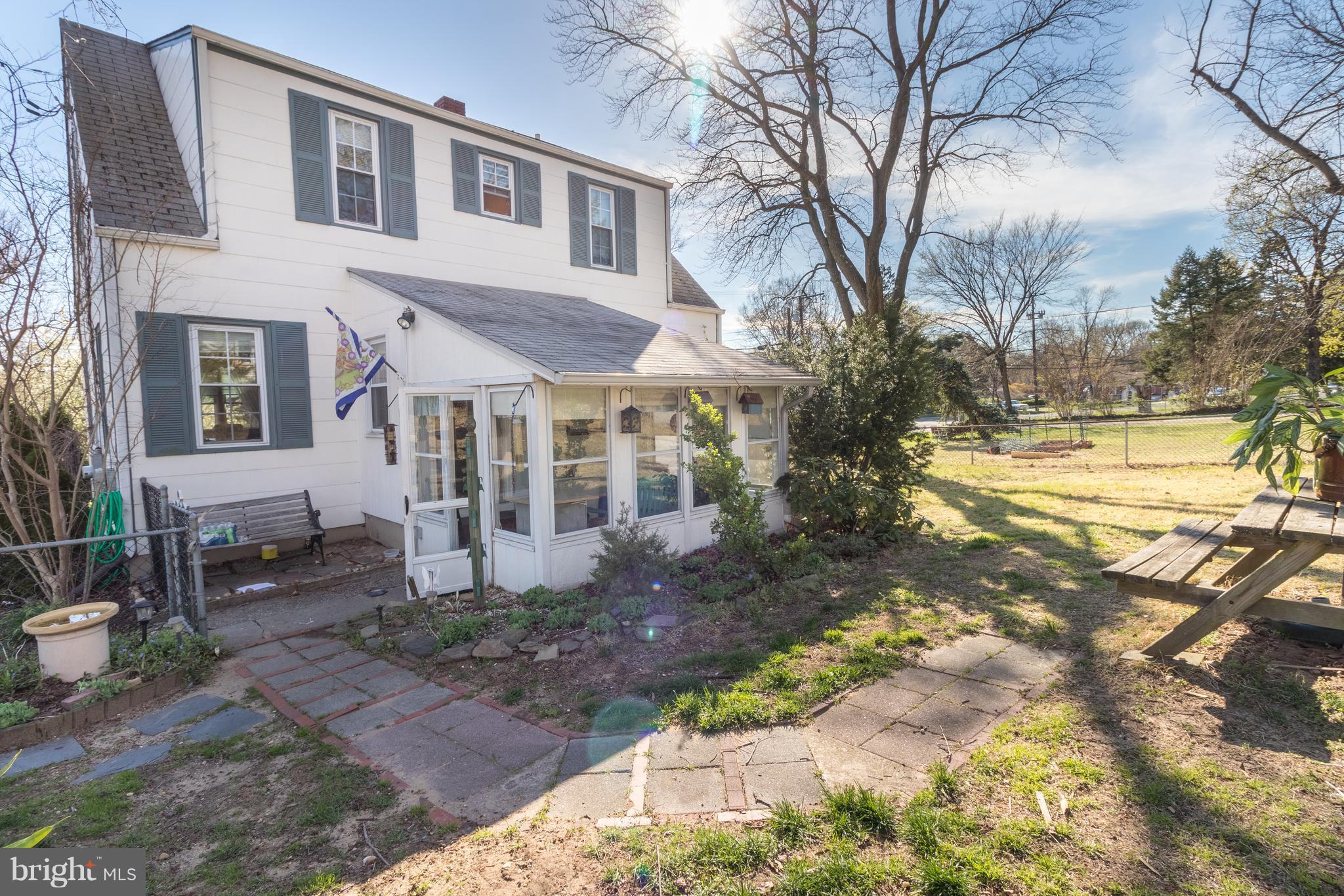 4508 Powder Mill Road Beltsville, MD 20705 - Photo 16 of 16 Sunroom addition and large yard with swing!
