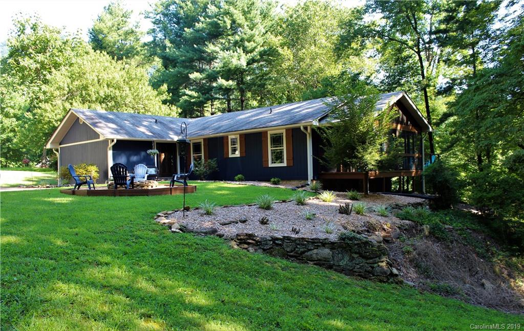 114 Riverview Road Tryon, NC 28782 - Photo 2 of 32 a view of outdoor space yard and deck