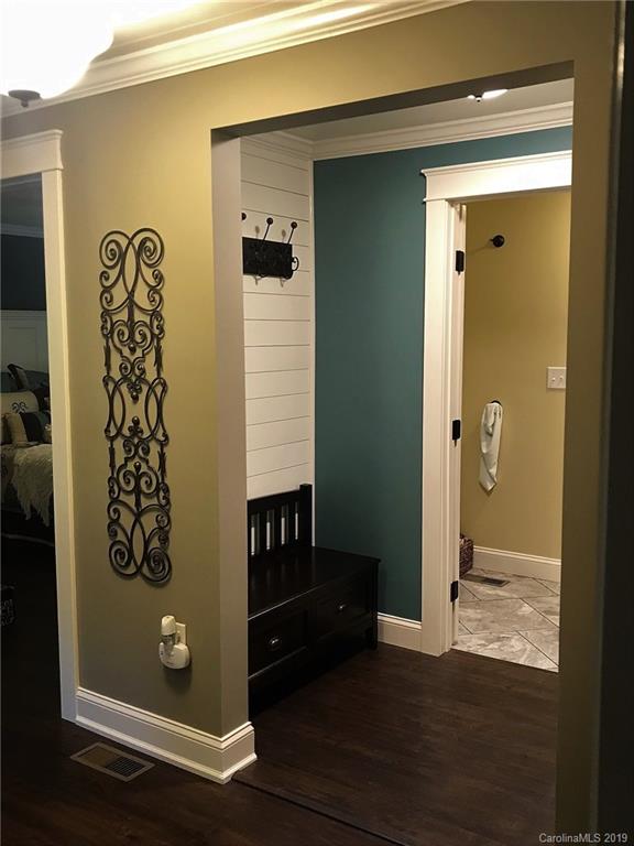 114 Riverview Road Tryon, NC 28782 - Photo 16 of 32 view of room with window and wardrobe