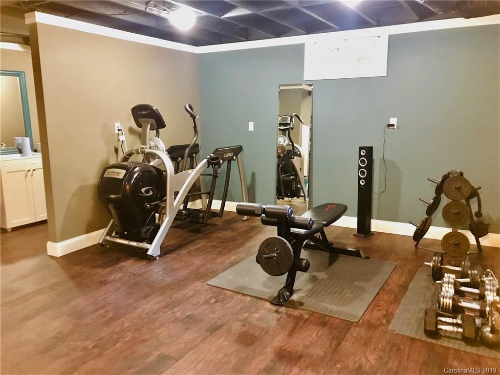 114 Riverview Road Tryon, NC 28782 - Photo 23 of 32 a view of a room with gym equipment
