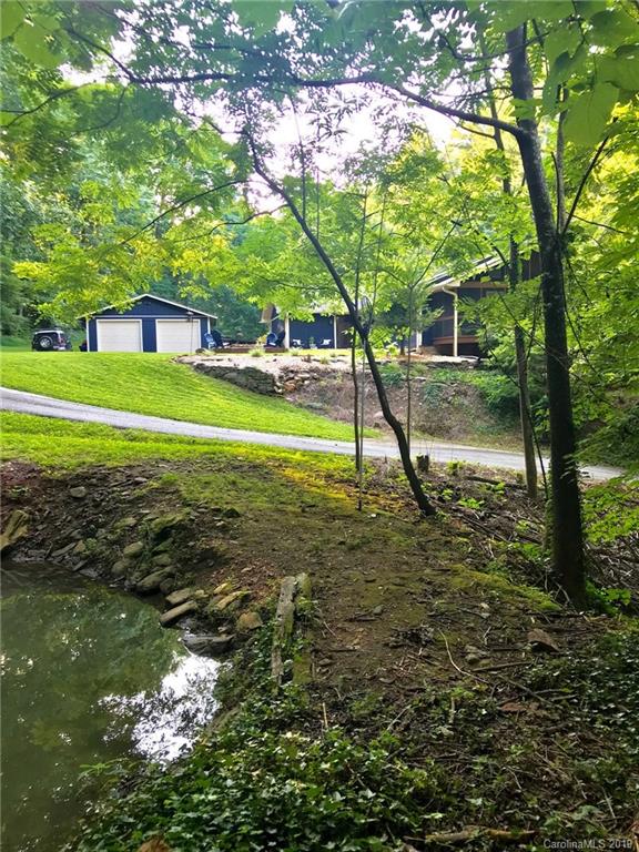 114 Riverview Road Tryon, NC 28782 - Photo 32 of 32 a view of a house with a yard