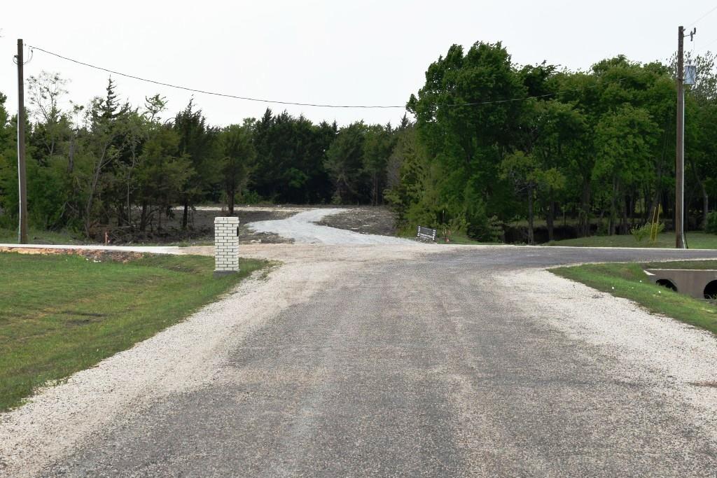 730 Cheyenne Trail Trenton, TX 75490 - Photo 2 of 19 a view of a park with large trees