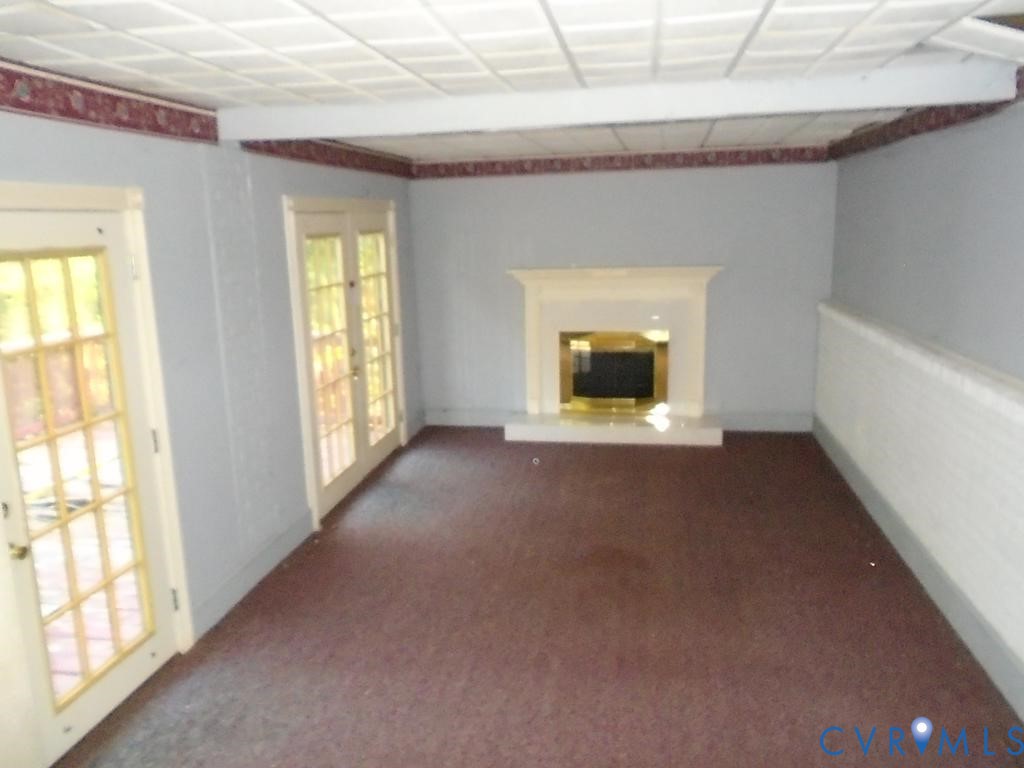 16203 West Patrick Henry Road Montpelier, VA 23192 - Photo 21 of 23 Interior space featuring a fireplace with a mantel