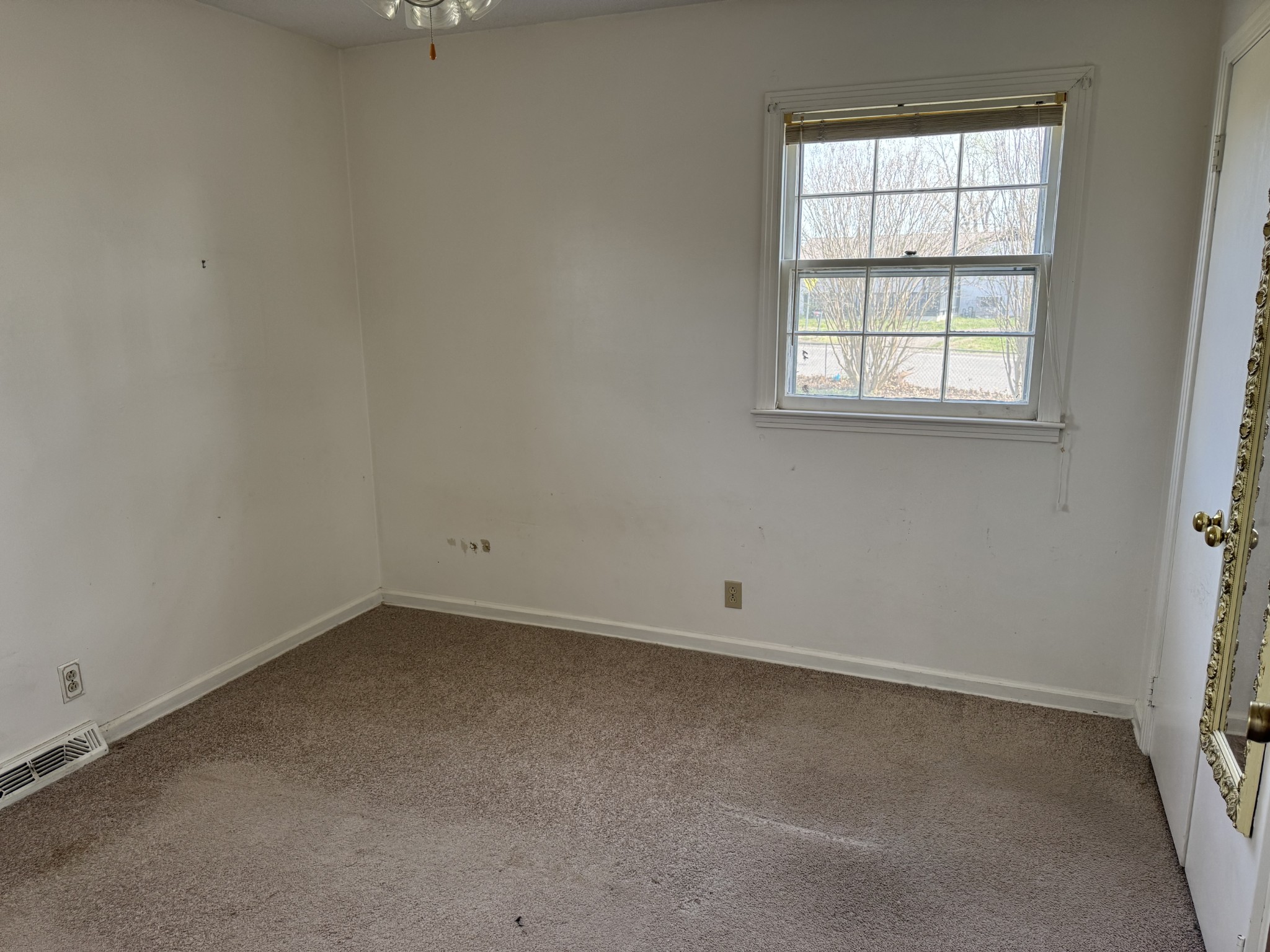 201 Orchard Road Clarksville, TN 37042 - Photo 14 of 24 an empty room with a window