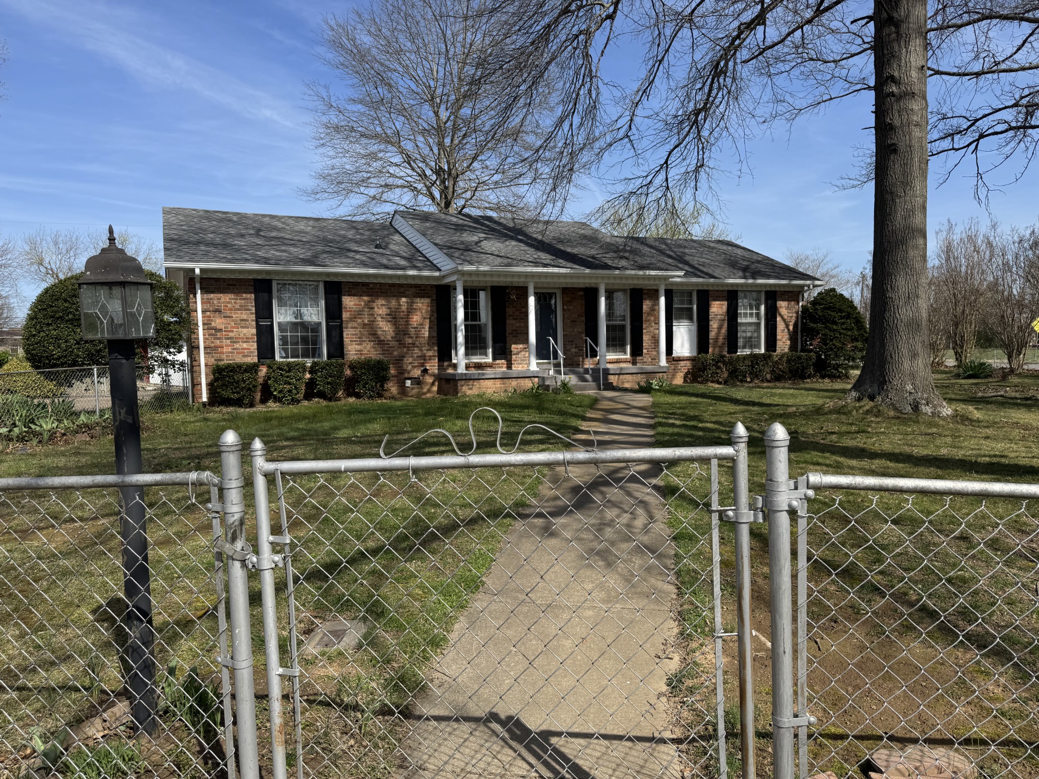 201 Orchard Road Clarksville, TN 37042 - Photo 2 of 24 a front view of a house with garden