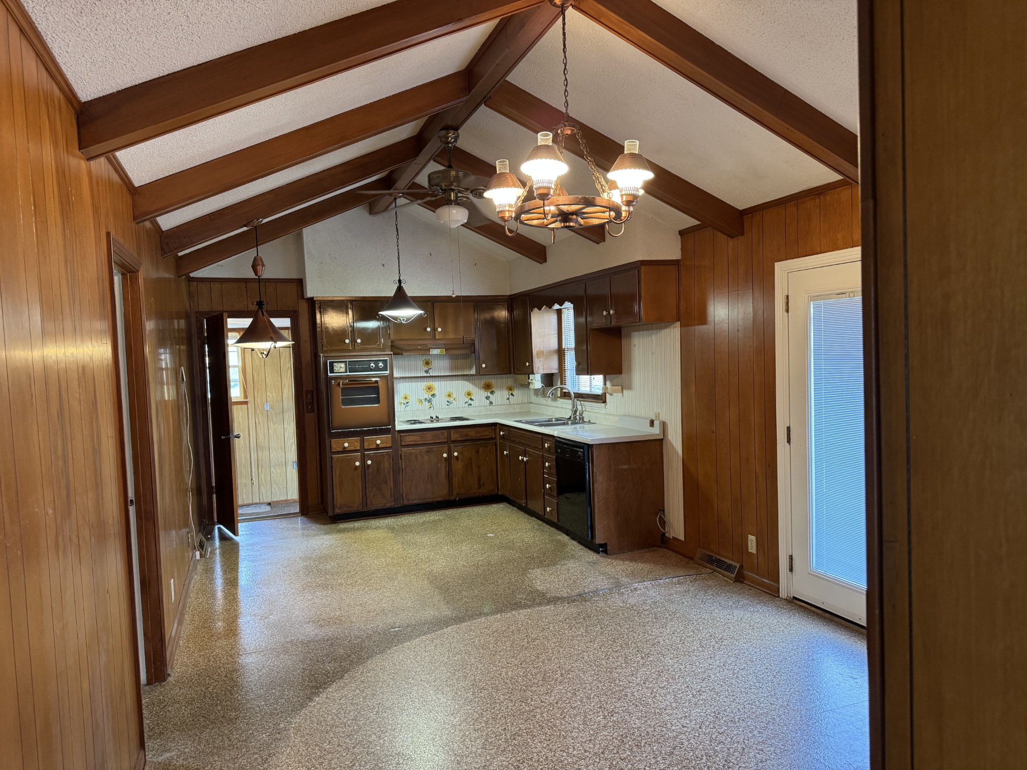 201 Orchard Road Clarksville, TN 37042 - Photo 6 of 24 a large kitchen with a chandelier