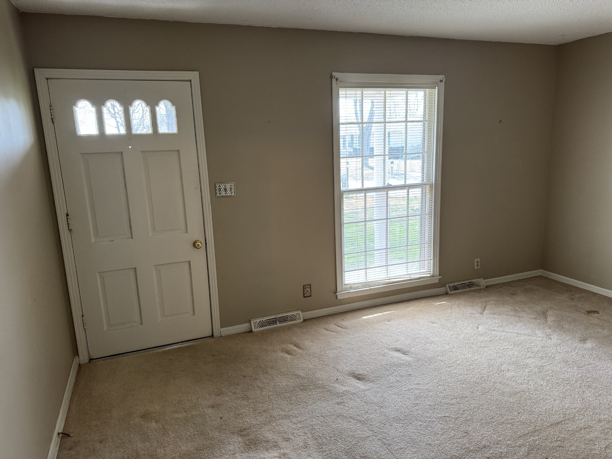 201 Orchard Road Clarksville, TN 37042 - Photo 9 of 24 a view of empty room with windows