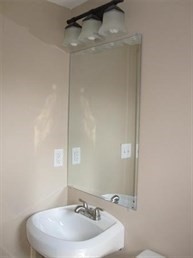 26 Hopewell Road Boston, MA 02136 - Photo 12 of 16 a bathroom with a sink and mirror