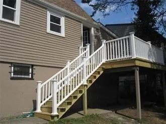 a view of a house with a small yard
