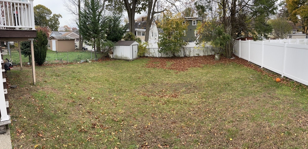 26 Hopewell Road Boston, MA 02136 - Photo 16 of 16 a view of a house with a yard and tree s