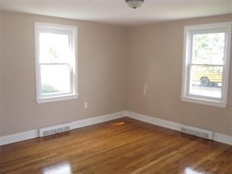 26 Hopewell Road Boston, MA 02136 - Photo 7 of 16 a view of a room with wooden floor and windows
