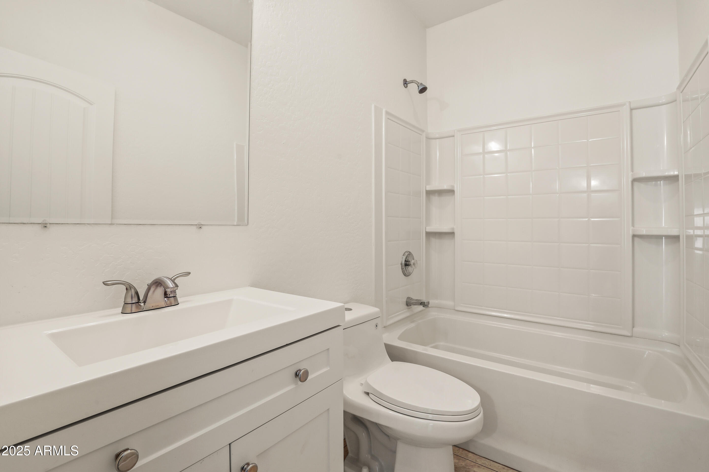 1014 West Summit Street Payson, AZ 85541 - Photo 20 of 21 a bathroom with a sink a toilet and shower