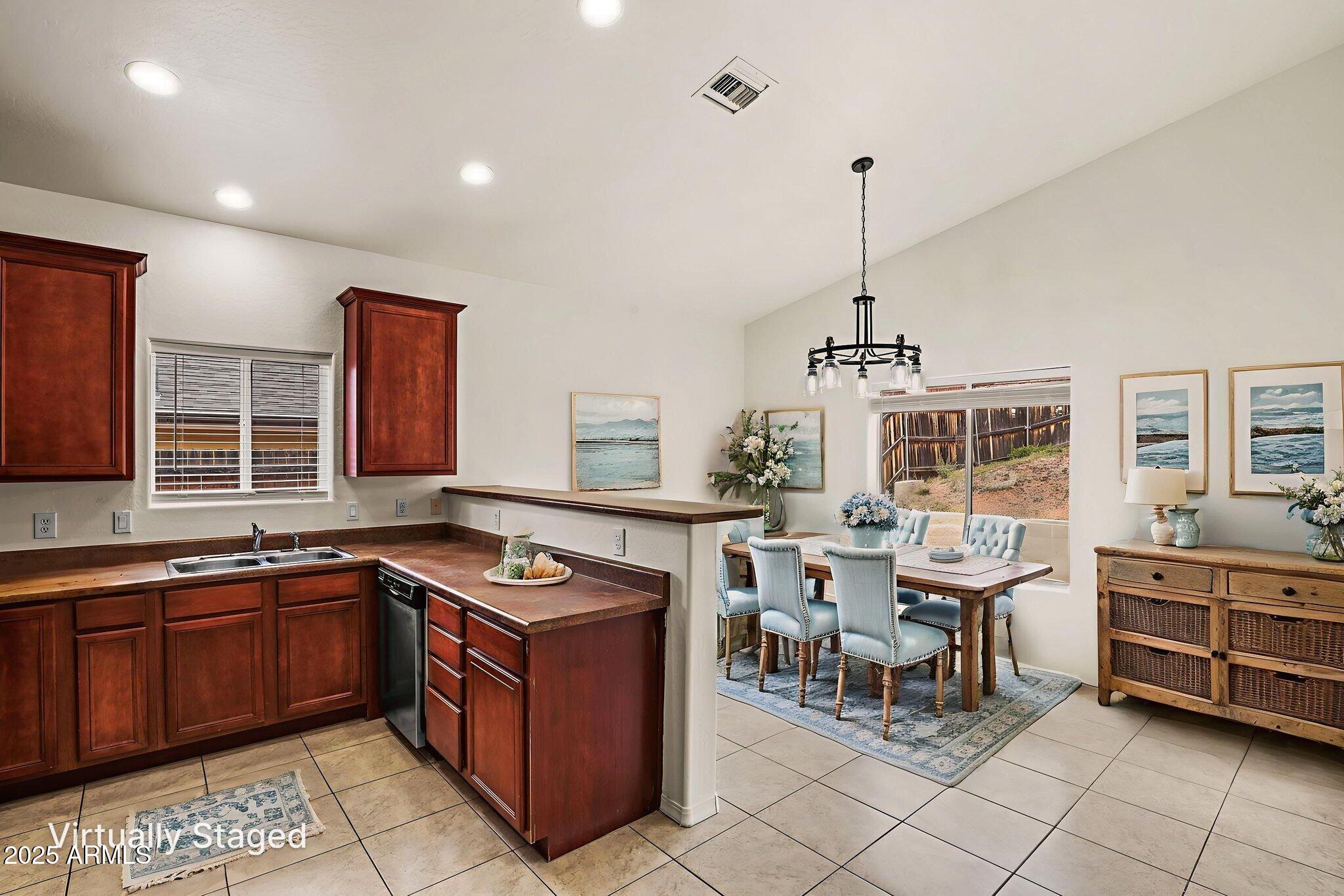 1014 West Summit Street Payson, AZ 85541 - Photo 4 of 21 a kitchen that has a table and chairs in it