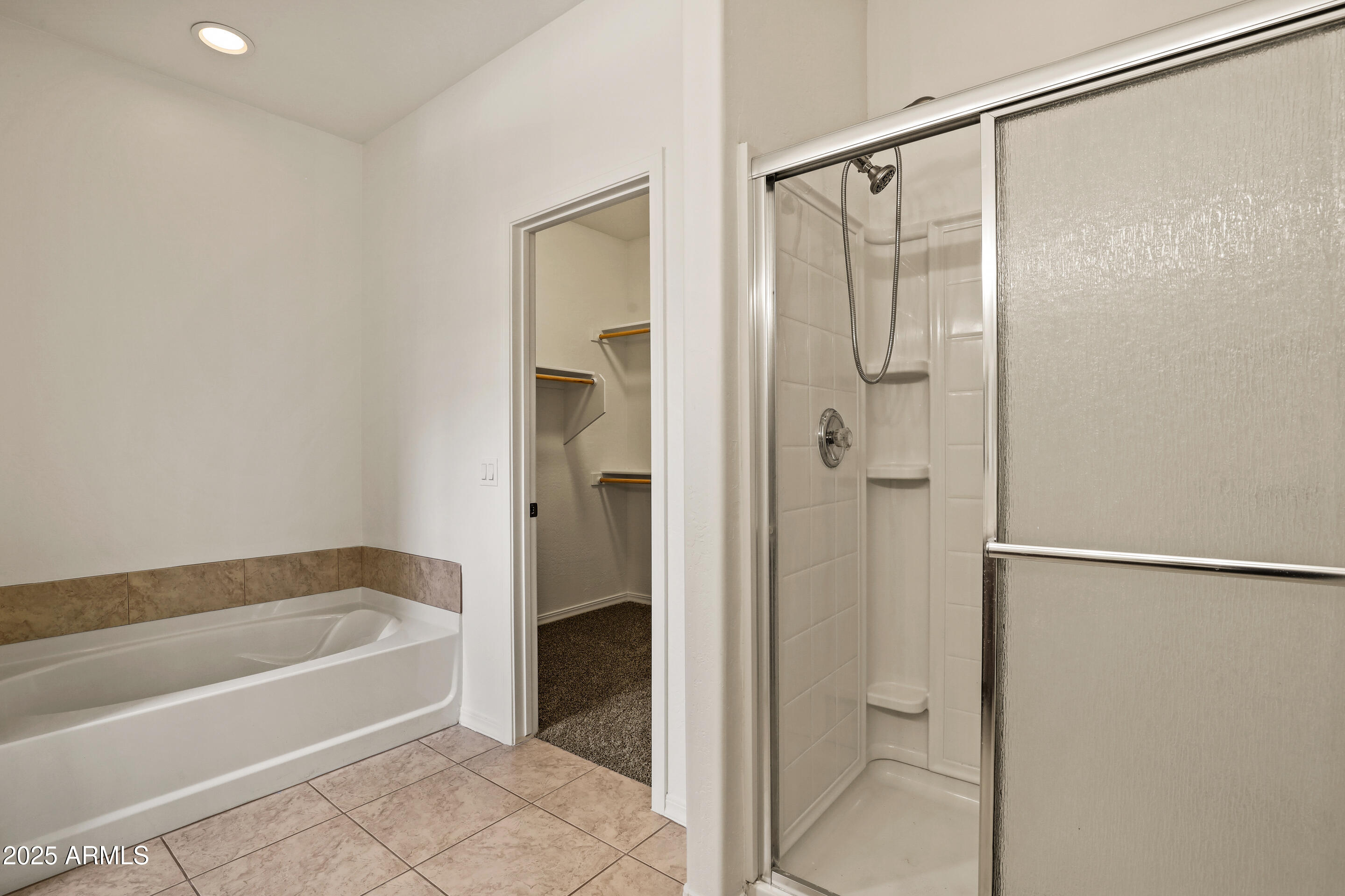 1014 West Summit Street Payson, AZ 85541 - Photo 8 of 21 a bathroom with a bathtub and a shower