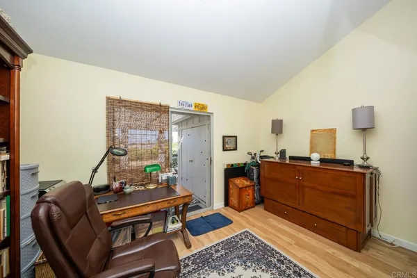 a living room with furniture and a table