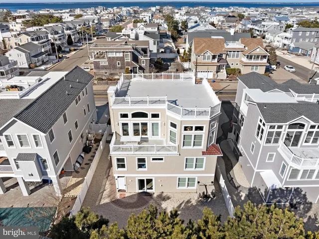 a view of a swimming pool with furniture