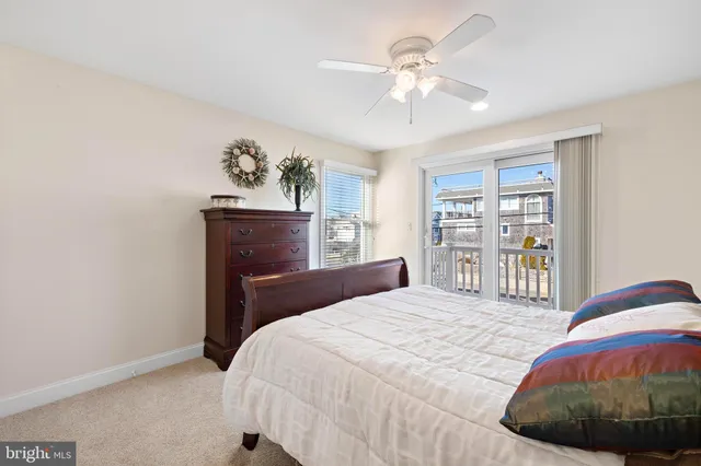 a bathroom with a granite countertop sink vanity and a mirror