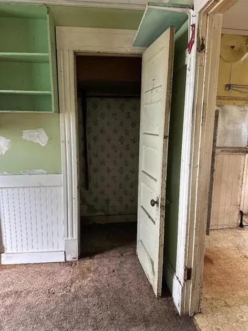 a large kitchen with a large window