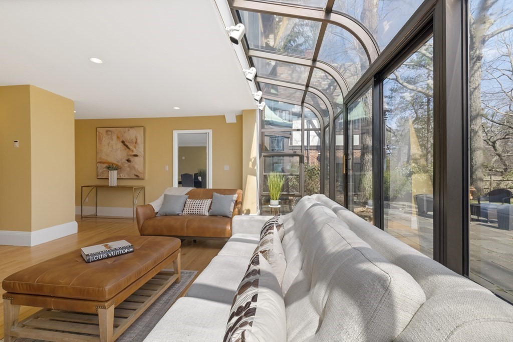 77 Hallwood Road Brookline, MA 02467 - Photo 12 of 42 a living room with furniture and a large window