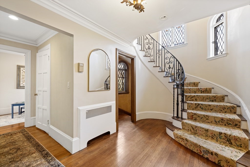 77 Hallwood Road Brookline, MA 02467 - Photo 22 of 42 a view of entryway and hall with wooden floor
