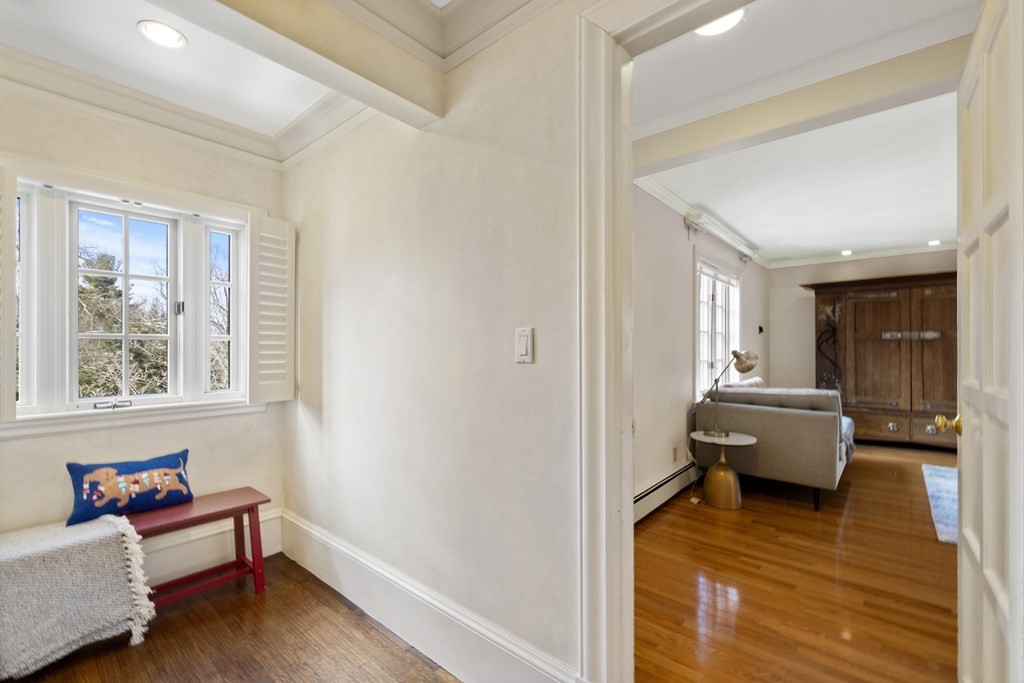77 Hallwood Road Brookline, MA 02467 - Photo 24 of 42 a living room with furniture and wooden floor