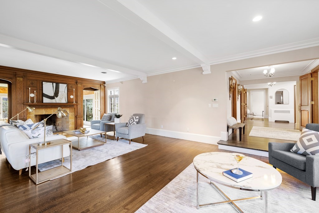 77 Hallwood Road Brookline, MA 02467 - Photo 3 of 42 a living room with furniture or couch and a table