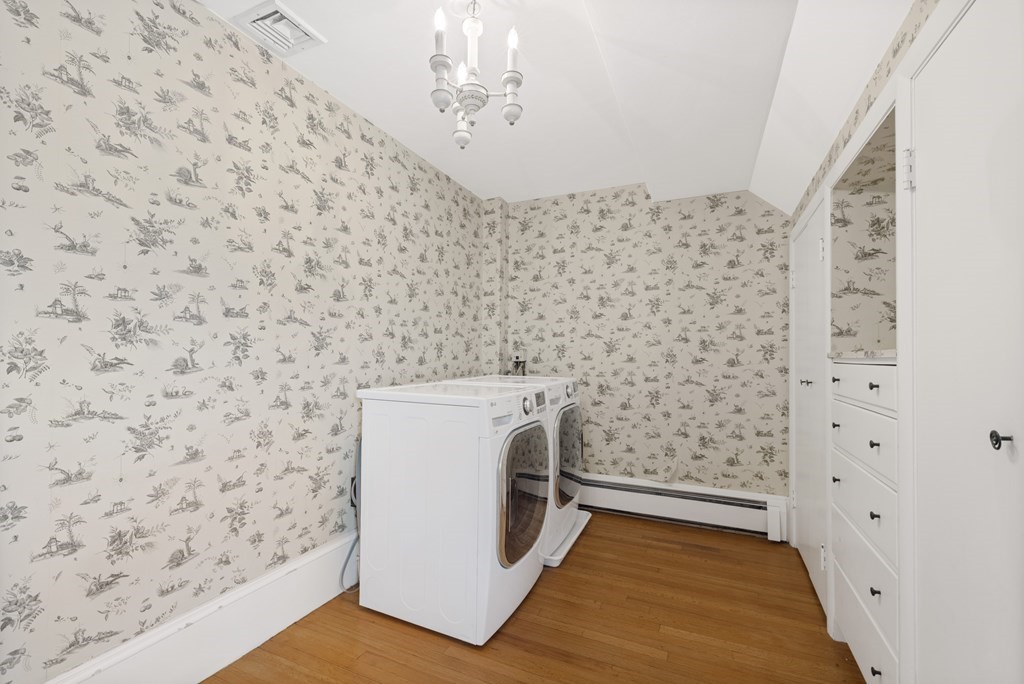77 Hallwood Road Brookline, MA 02467 - Photo 35 of 42 a utility room with a washer and dryer