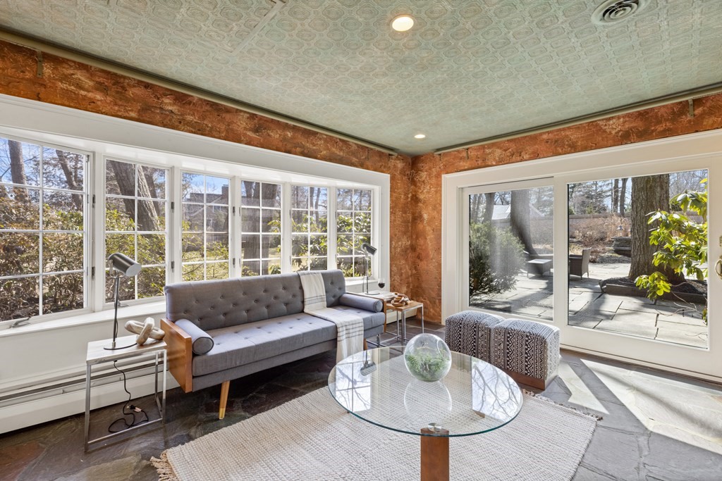 77 Hallwood Road Brookline, MA 02467 - Photo 7 of 42 a living room with furniture and a large window