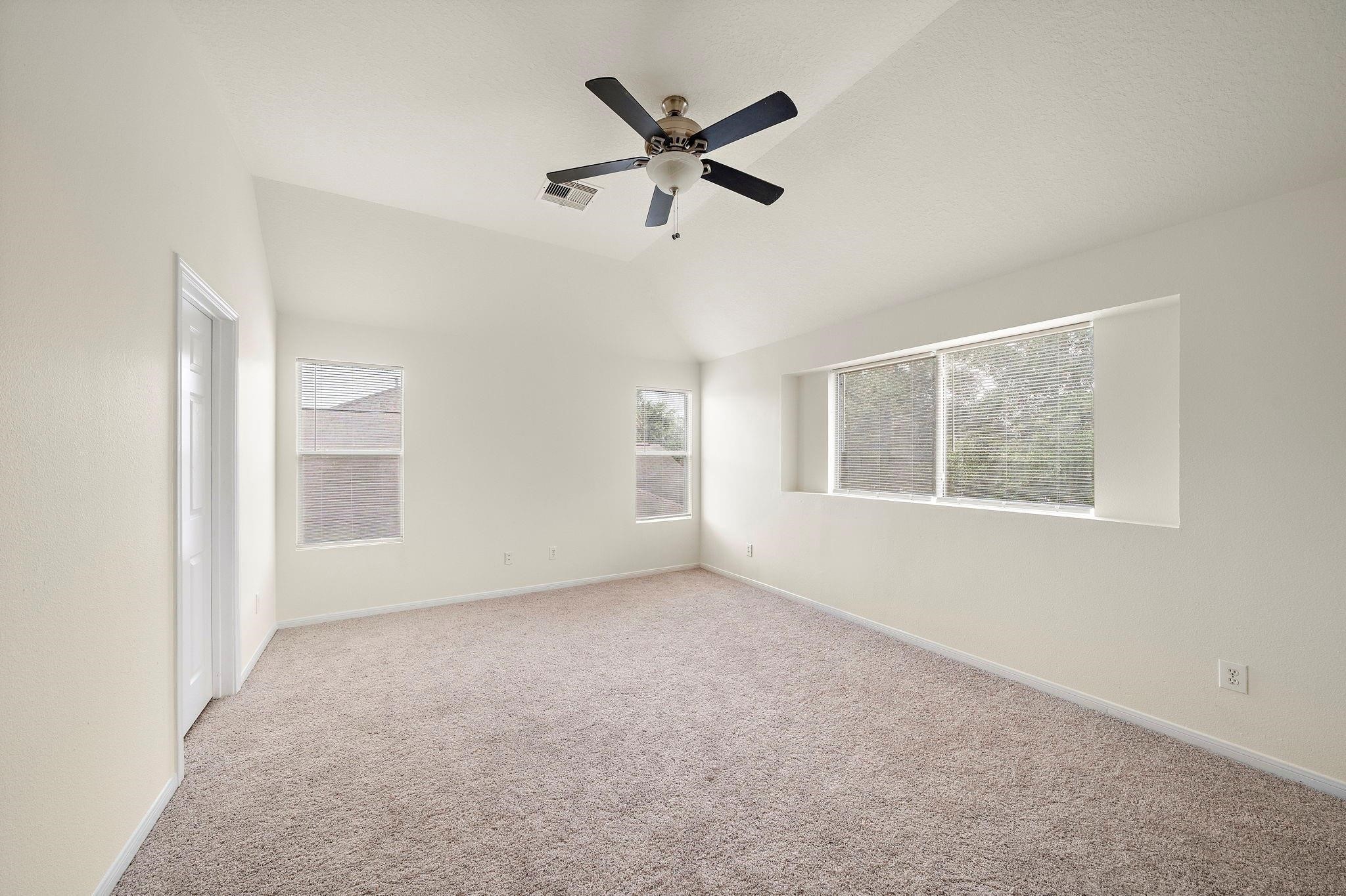 3235 Clipper Winds Way Houston, TX 77084 - Photo 3 of 26 a view of an empty room with a window
