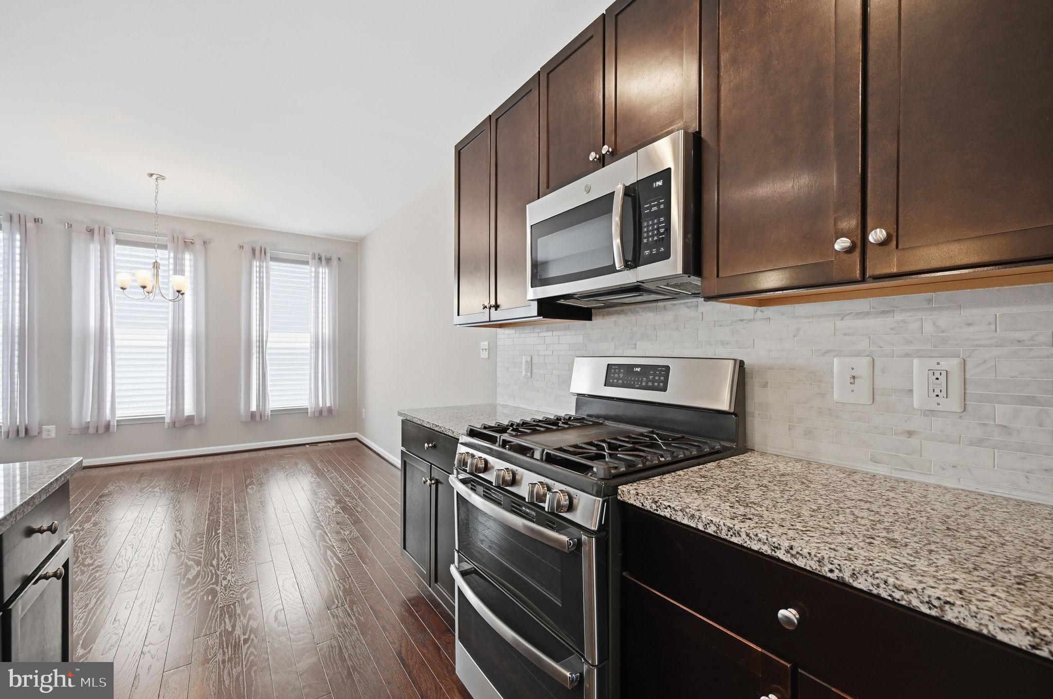 650 Aspen Road, Unit 108 Stafford, VA 22554 - Photo 4 of 26 Modern kitchen with elegant finishes.