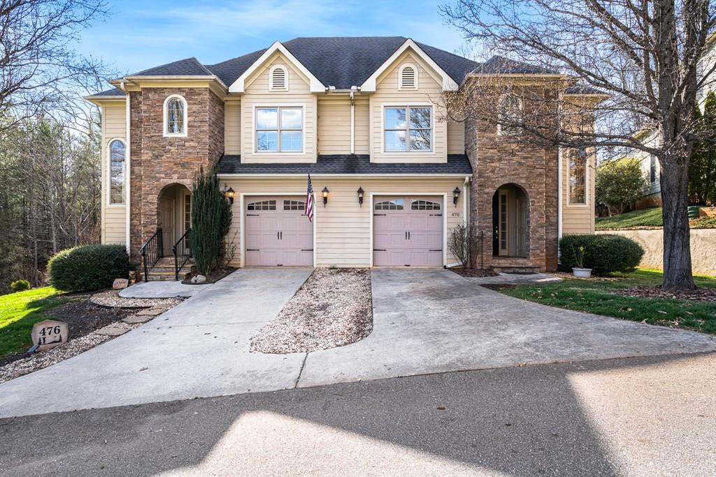 476 Licklog Ridge Hayesville, NC 28904 - Photo 1 of 41 a front view of a house with garden